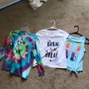 A bundle of three medium sized T-shirts for girls